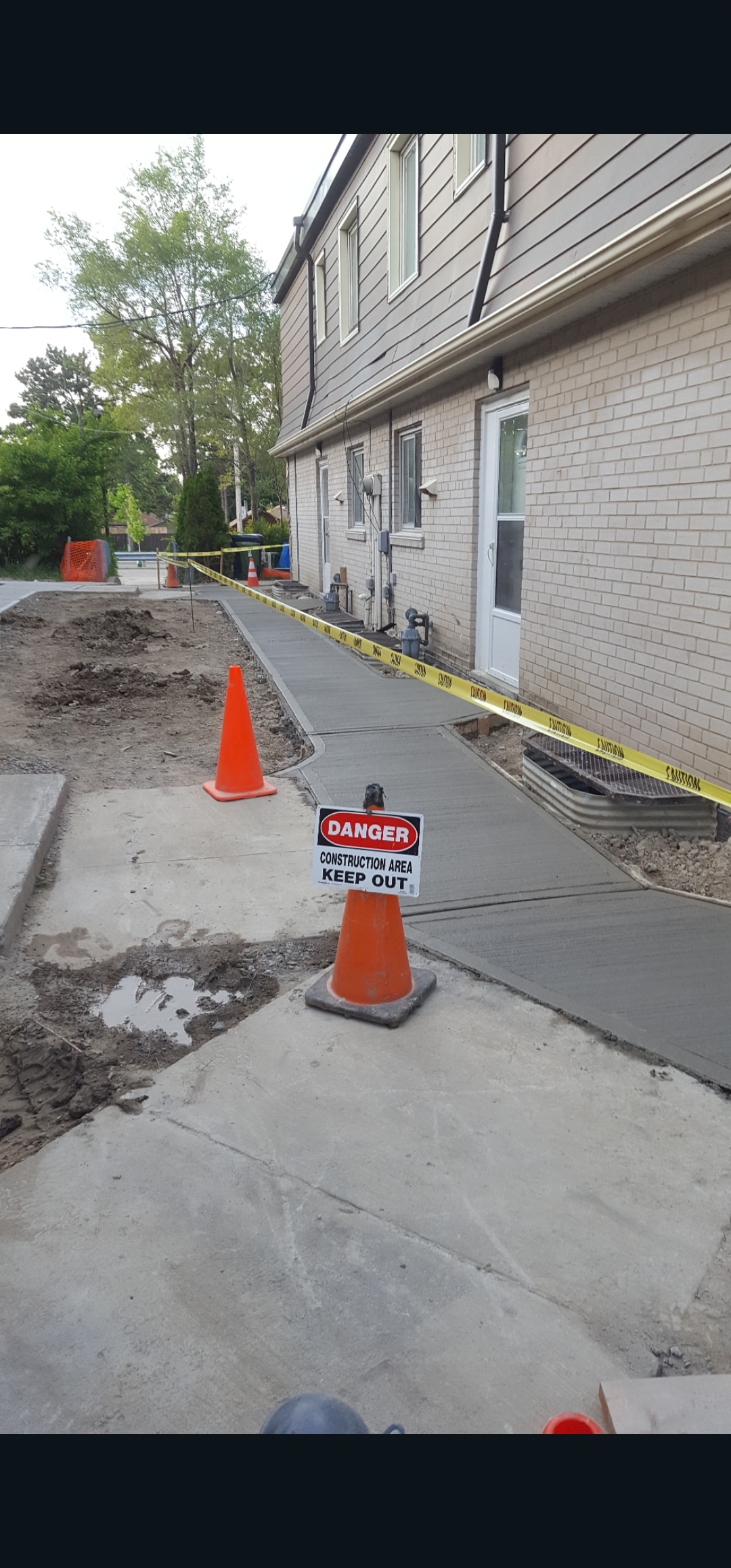 Freshly Poured Concrete Walkway — Properly Cordoned Off