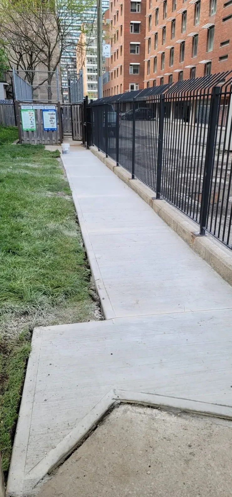 Concrete Walkway — Iron Security Fence, TCH Property
