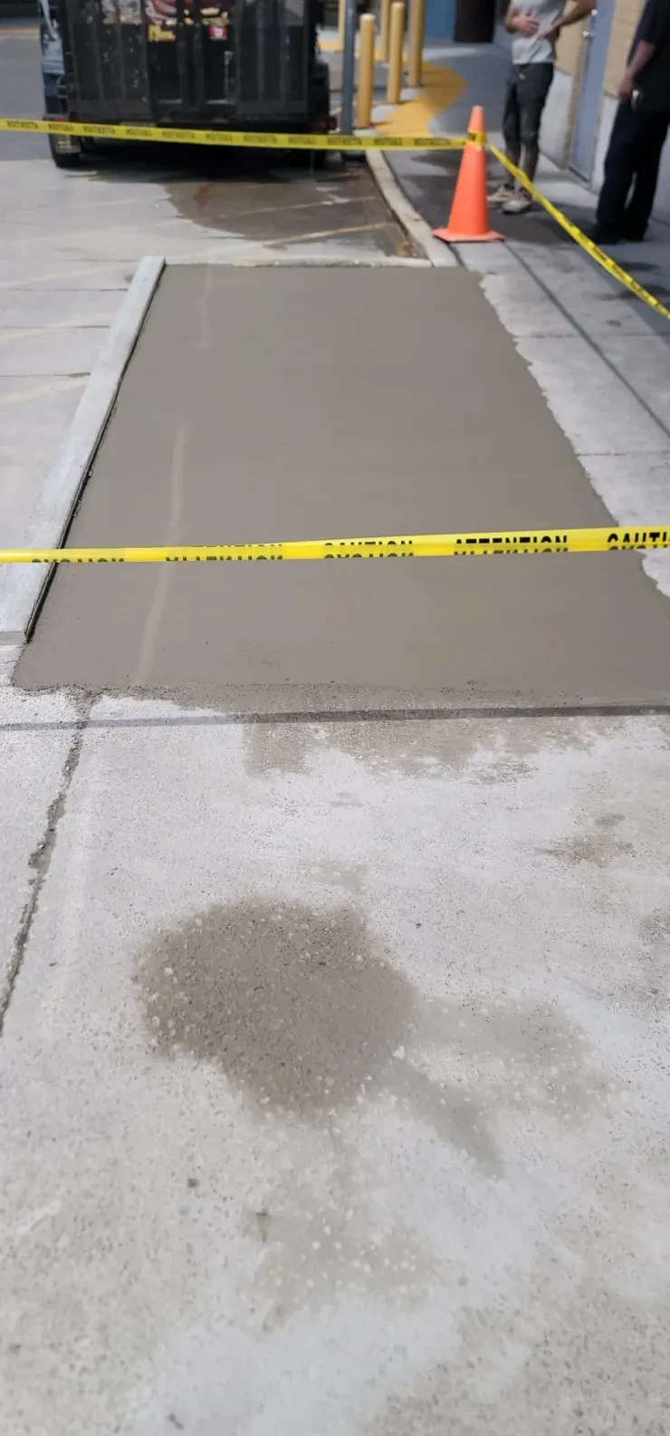 Wet Concrete Sidewalk — Freshly Poured & Cordoned Off