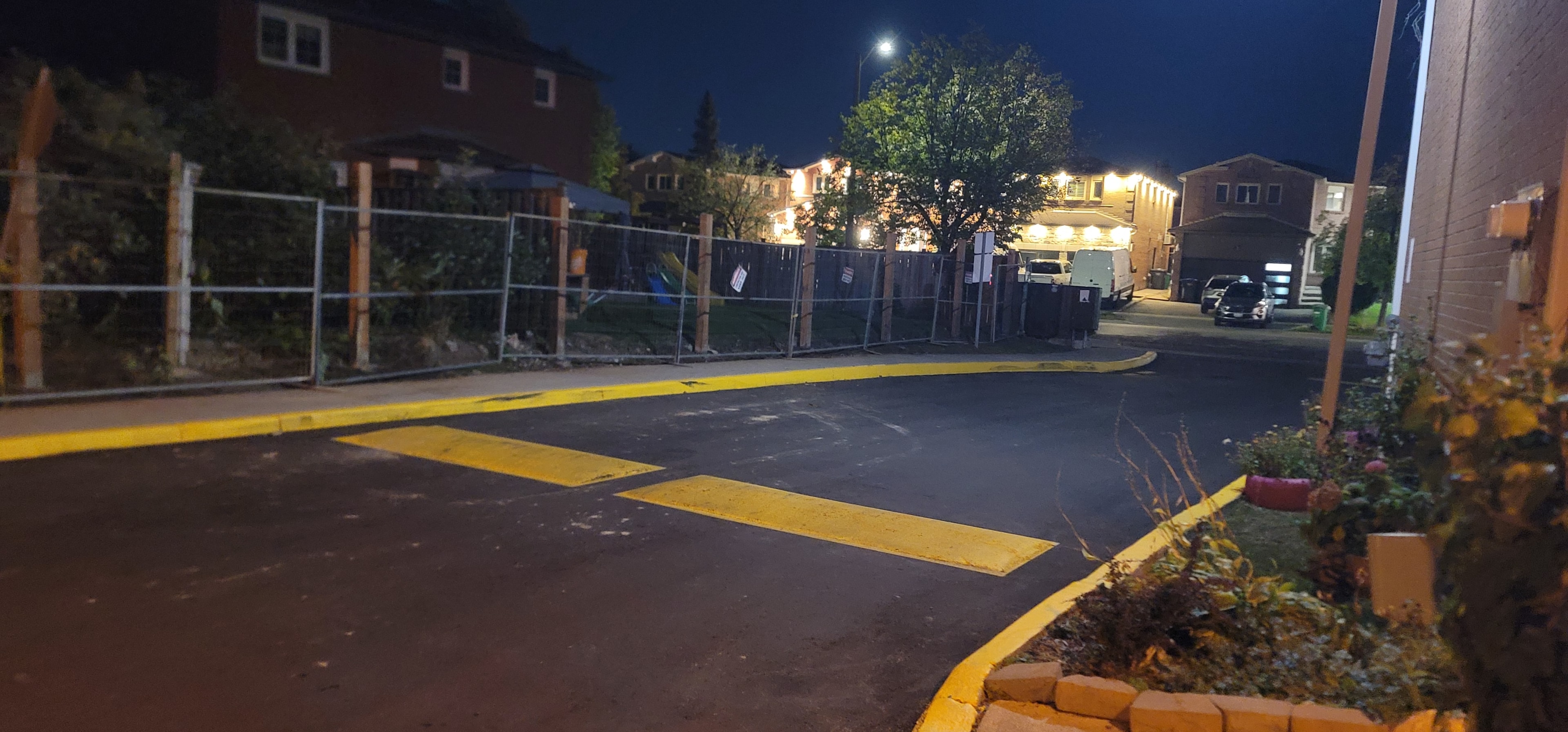 Parking Lot Line Painting — Yellow Curbs & Crosswalk, Night View