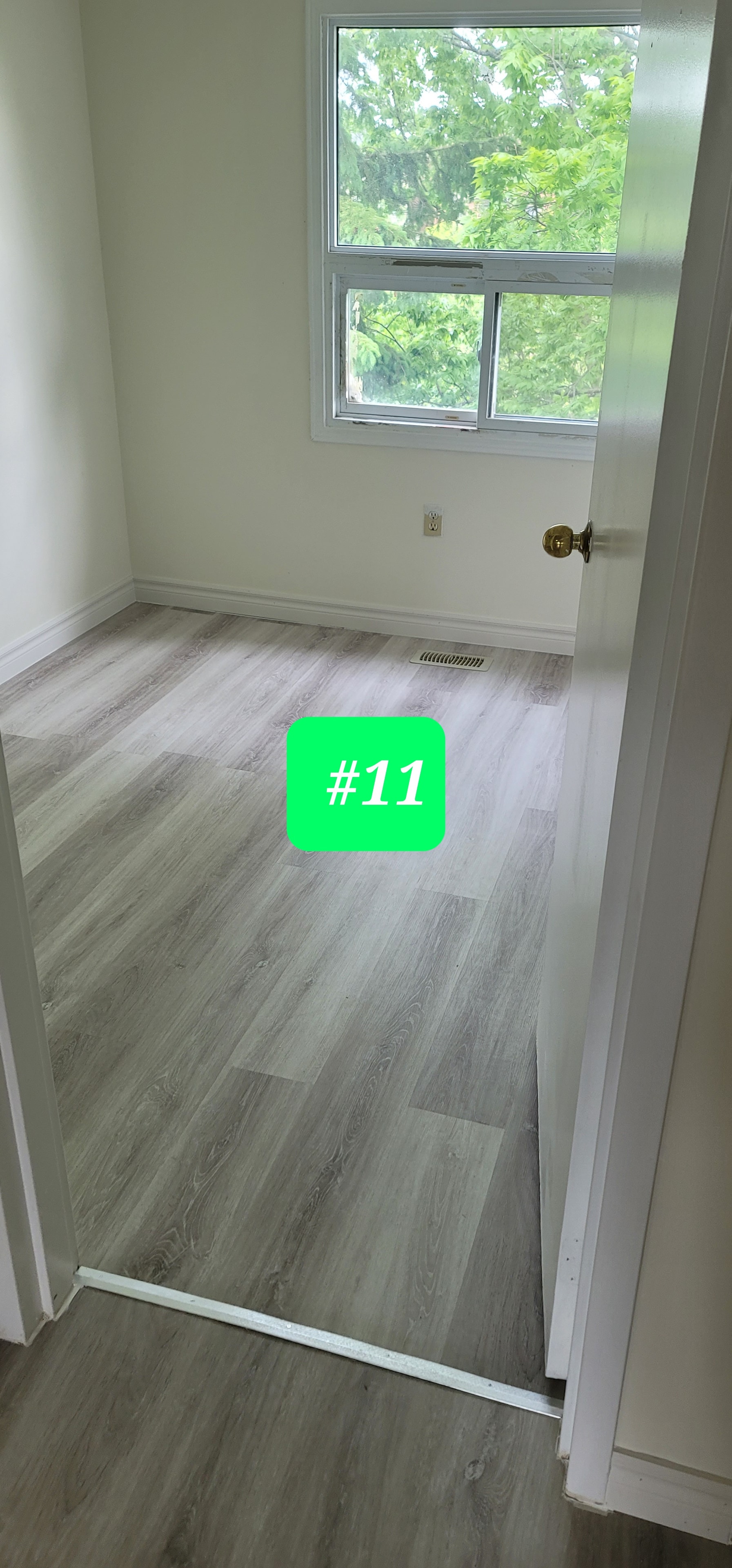Unit #11 — Bedroom with New Vinyl Plank Flooring