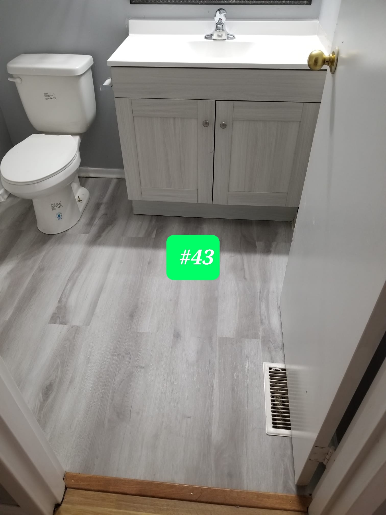 Unit #43 — Bathroom Renovation, New Flooring & Vanity