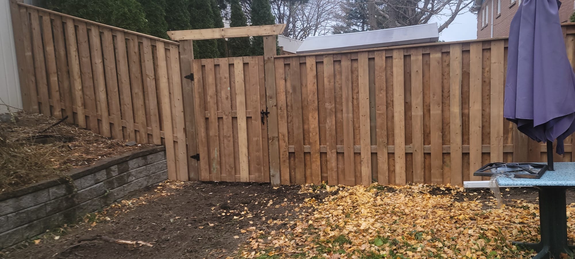 Wood Fence & Gate with Black Hardware — Commercial Housing Unit, Autumn