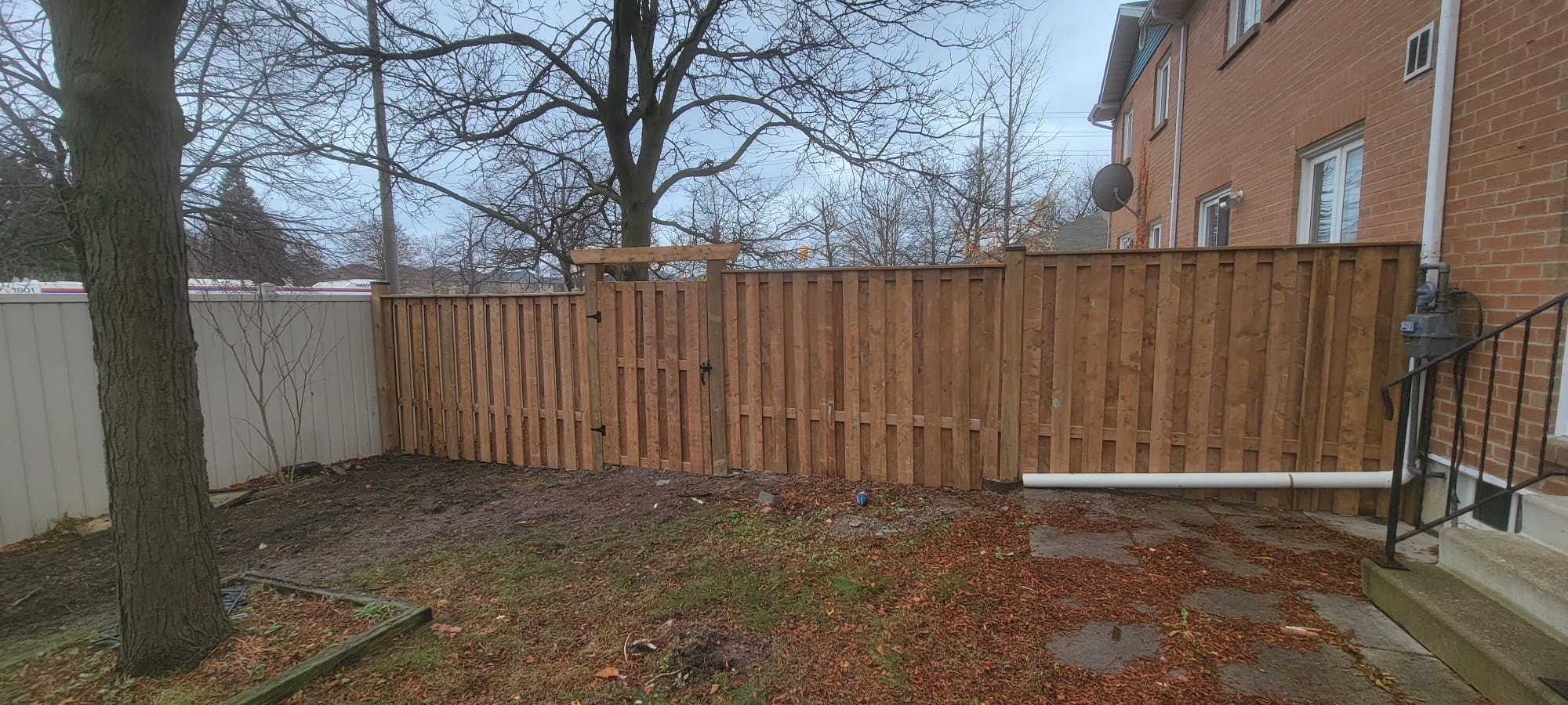 Wood Privacy Fence with Gate — Commercial Housing Unit, Completed