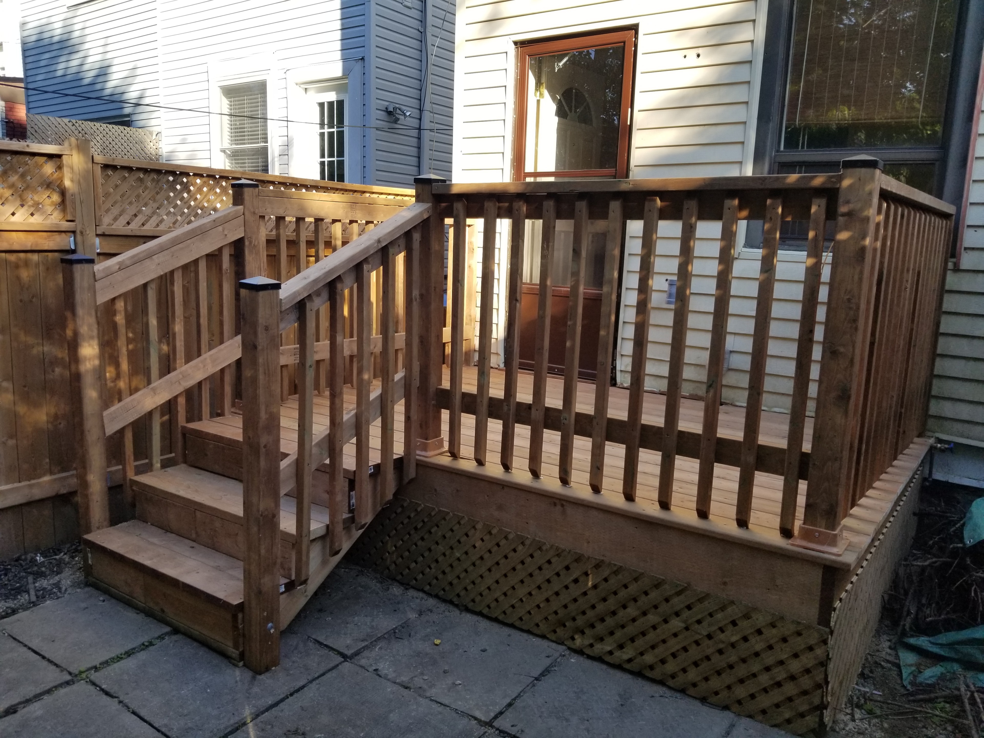 Wooden Deck with Stairs & Railing — Completed, Commercial Housing Unit